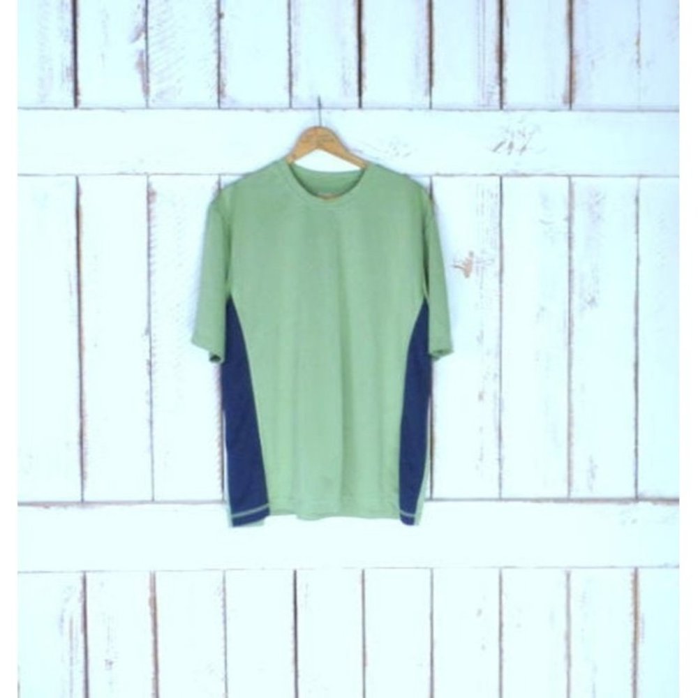 Light green and dark blue athletic performance short sleeve shirt